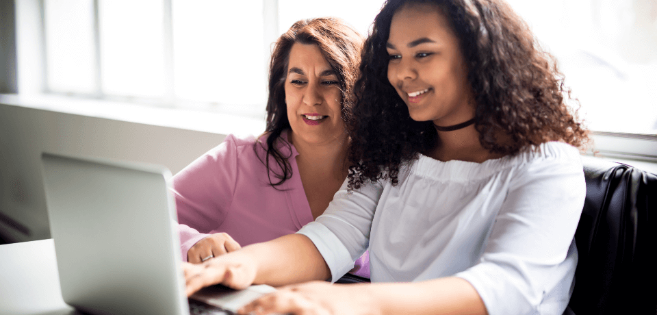 Career Coach mentor and student working together on a laptop, illustrating personalized career path exploration for students through Ontario Career Lab